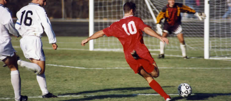 Let's kick things off with a massive global rhythm. Can you name the game playing out on this pitch?