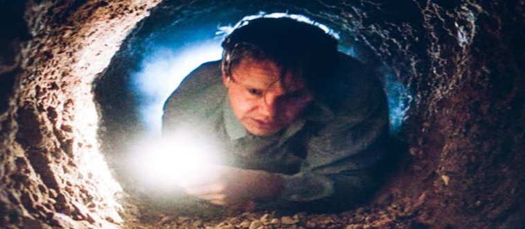 Let's kick off the playlist with this classic track: a patient guy spends years chipping away at a wall with a tiny hammer, all for a messy, slow-groove escape through a sewer pipe.