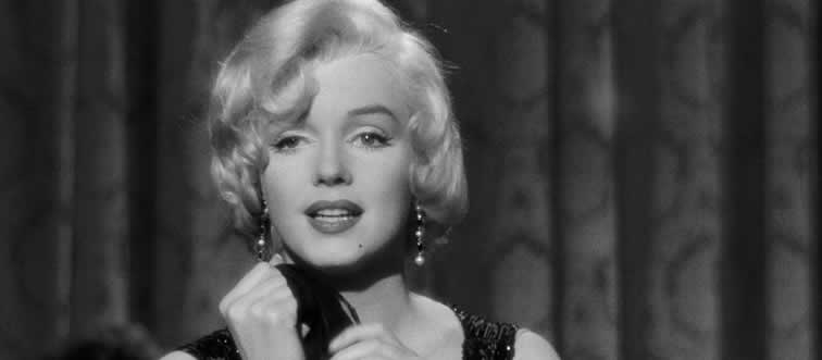 Let's kick things off with a classic look: whose silver-screen presence matches this unforgettable snapshot?